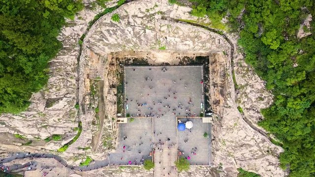 Fengxiangsi cave from above. Panorama view of Longmen Grottes in front of the river at Luyoang, China