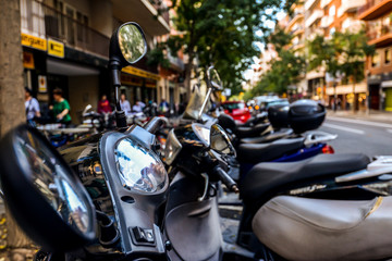 Fototapeta na wymiar Scooters in the street - Barcelona