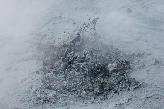splashing mud in geothermal area in Iceland