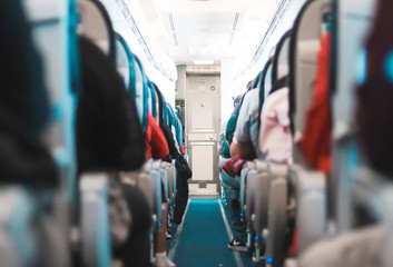 passengers sitting on an airplane