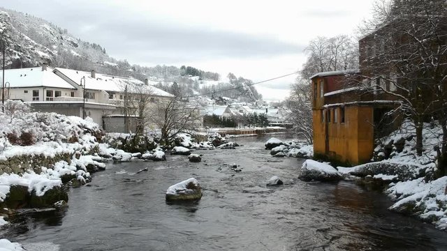 Moi bridge, Norway - winter day, snow
Flying under bridge
Drone footage over river towards bridge in Moi, Rogaland, Norway