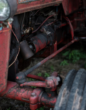 Detail: tin can hanging on tractor engine