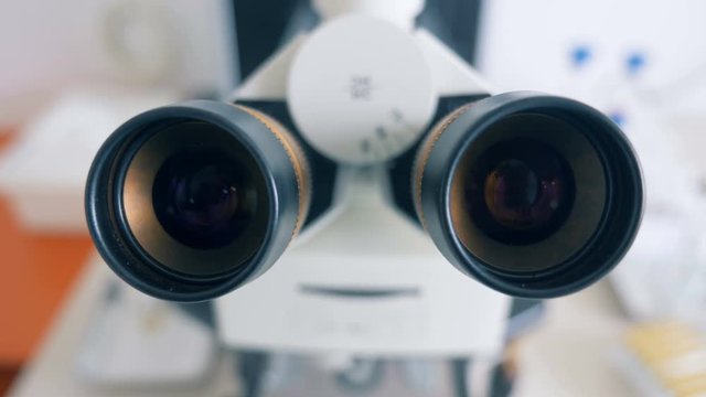 Close up of two oculars of a microscope