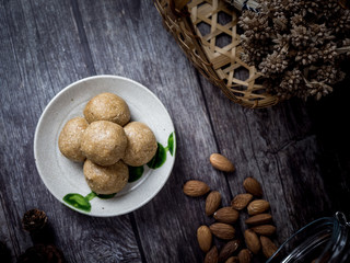 Healthy organic date energy balls with almond, dried fruits and nuts. Food for healthy lifestyle.