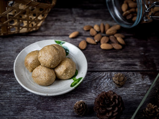 Healthy organic date energy balls with almond, dried fruits and nuts. Food for healthy lifestyle.