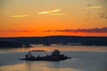 Stunning fjord landscape in Scandinavia with dramatic sunrise.