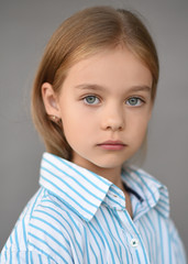 portrait of little girl outdoors in summer