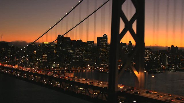Aerials USA San Francisco Oakland Bay Bridge sunset city