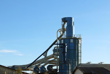 Air duct pipe and roof for industrial with blue sky background.