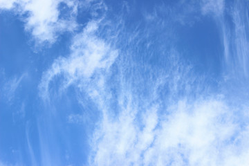 White clouds on deep blue sky