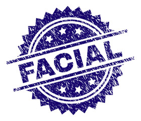 FACIAL stamp seal watermark with distress style. Blue vector rubber print of FACIAL label with corroded texture.
