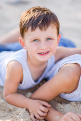 Portrait of a boy in the summer outdoors