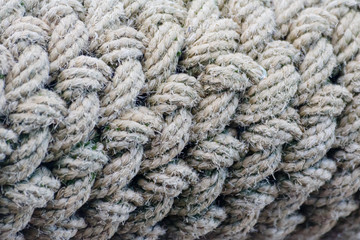 Fototapeta na wymiar Old brown weathered rope texture. Details closeup.