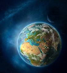 Lebanon from space on Earth surrounded by space with Moon and Milky Way. Detailed planet surface with city lights and clouds.