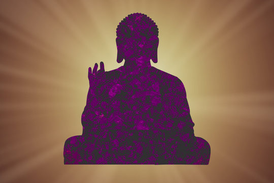 Silhouette of a buddha with rays and the sun in the background