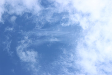 White clouds on deep blue sky right