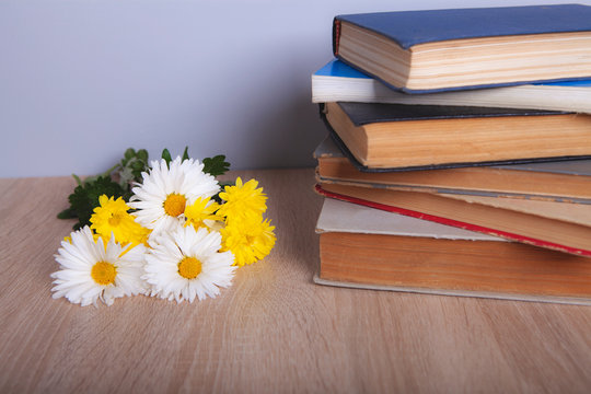books and beautiful flowers