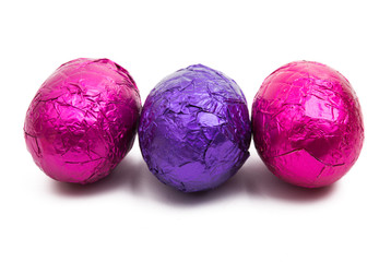 chocolate eggs in foil isolated