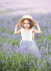 portrait of little girl outdoors in summer