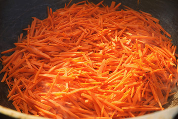 Fototapeta premium pilaf and other dishes in the cauldron. Methods and ingredients for cooking pilaf. Lamb and beef in Eastern cuisine