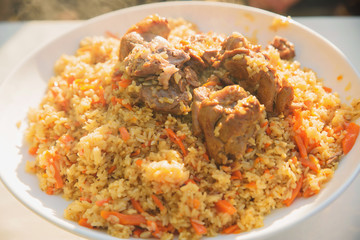 pilaf and other dishes in the cauldron. Methods and ingredients for cooking pilaf. Lamb and beef in Eastern cuisine