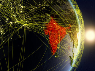 India in sunrise on planet planet Earth with network. Concept of connectivity, travel and communication.