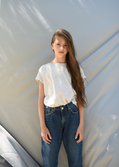 portrait of young girl outdoors in summer