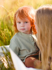 portrait of a little boy in nature © zagorodnaya