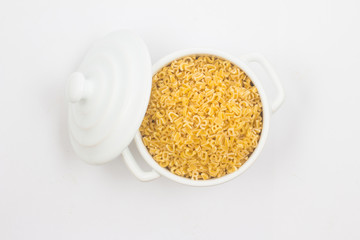 Letter-shaped pasta in a mini pan