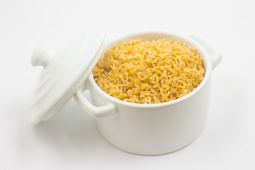 Letter-shaped pasta in a mini pan