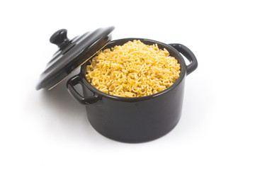 Letter-shaped pasta in a mini pan