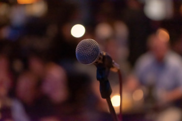 Microphone on a stage waiting for a singer to come to stage and perform