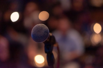 Microphone on a stage waiting for a singer to come to stage and perform