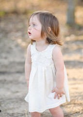 portrait of little girl outdoors in summer