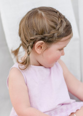 portrait of little girl outdoors in summer