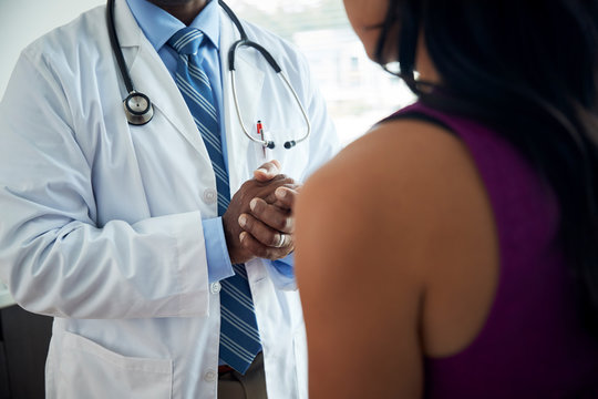 Doctor speaks with patient