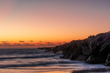 Fototapeta na wymiar Sunrise or Sunset by the beach