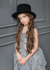 portrait of little girl outdoors in summer