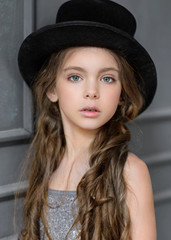 portrait of little girl outdoors in summer