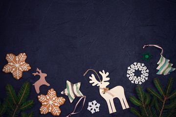 Christmas and New Year border or frame on black background. Winter holidays concept. Greeting template. Top view, toned