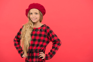 Fashionable beret accessory for female. How to wear french beret. Beret style inspiration. How to wear beret like fashion girl. Kid little cute girl with long hair posing in hat red background