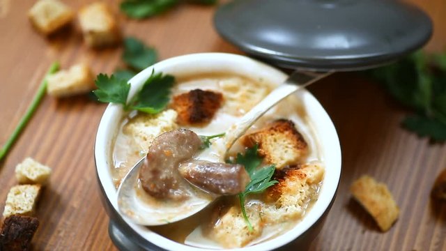 soup puree with mushrooms and croutons in an bowl