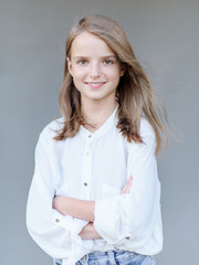 portrait of little girl outdoors in summer