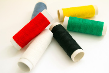 Coils of thread in the shape of the flag of Germany