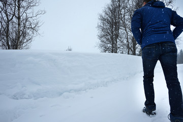 Walking on snowy road.