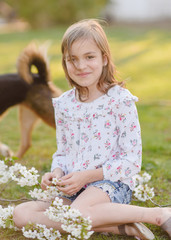 portrait of little girl outdoors in summer