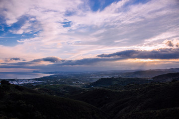 Naklejka premium Landscape. Beautiful evening sky and view of Estepona. Costa del Sol, Andalusia, Spain.