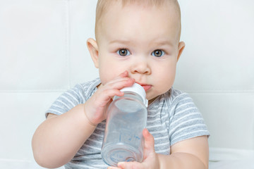 portrait of a little boy playing indoors