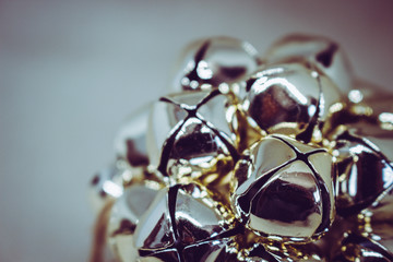 Christmas card. Golden Christmas ball on a light background.