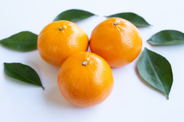 Fresh orange citrus fruit on white